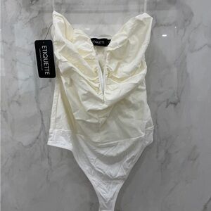 Etiquette Clothiers Cream Bodysuit